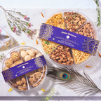 Halal Deepavali Twin Snack Bundle: the Deepavali Cookies Tray and Nuts & Snacks Tray side by side on marble